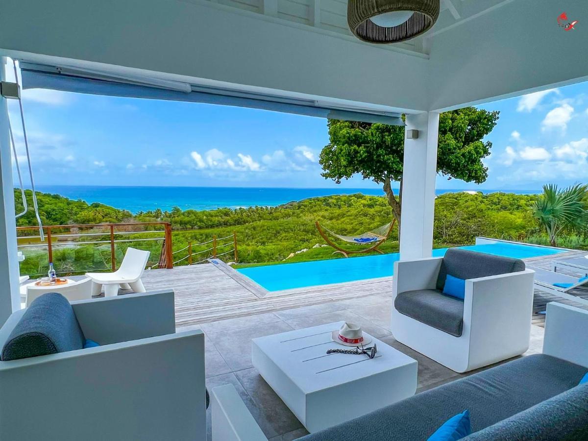 The View - Magnifique Villa Face A La Mer Sainte-Anne  Bagian luar foto