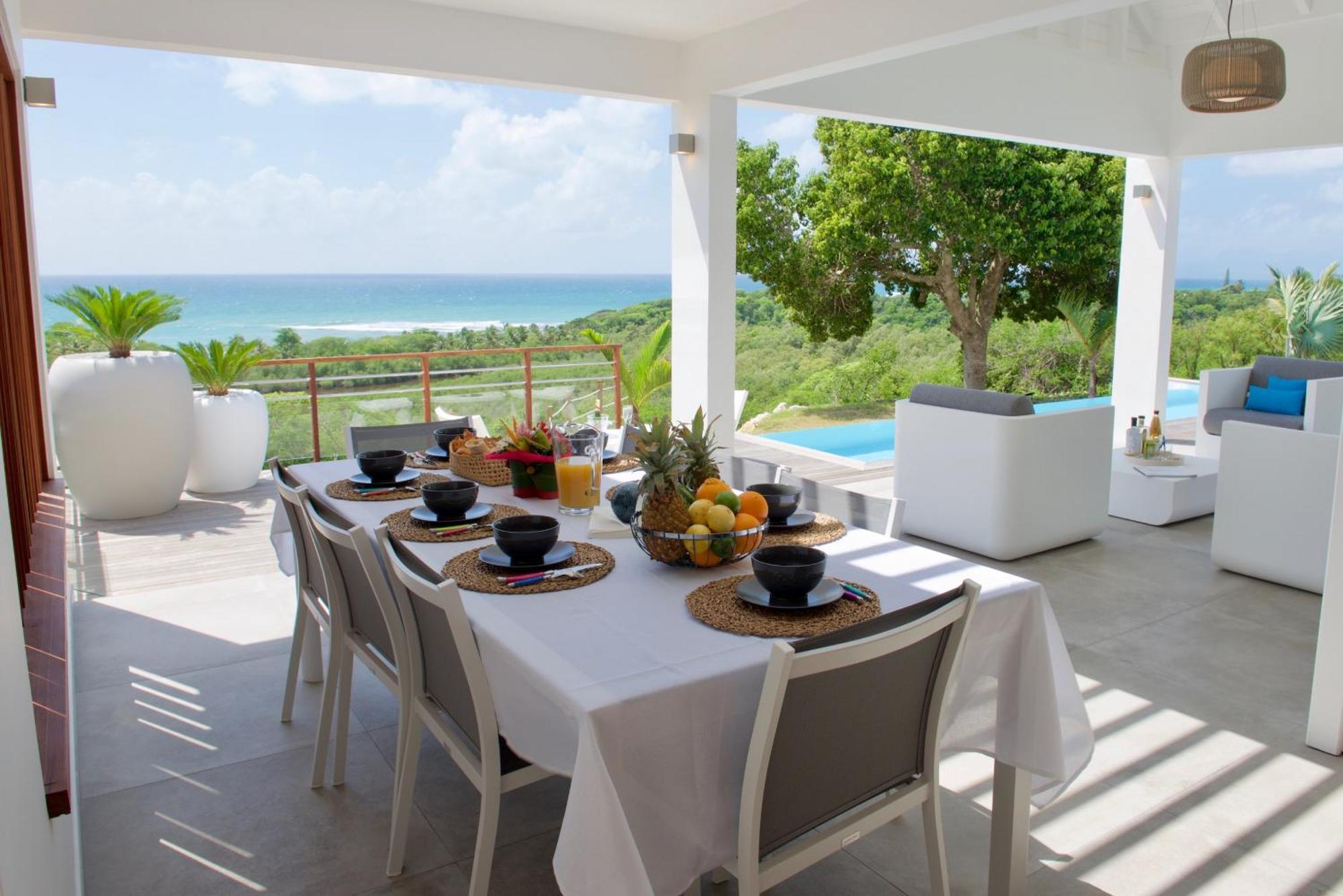 The View - Magnifique Villa Face A La Mer Sainte-Anne  Bagian luar foto